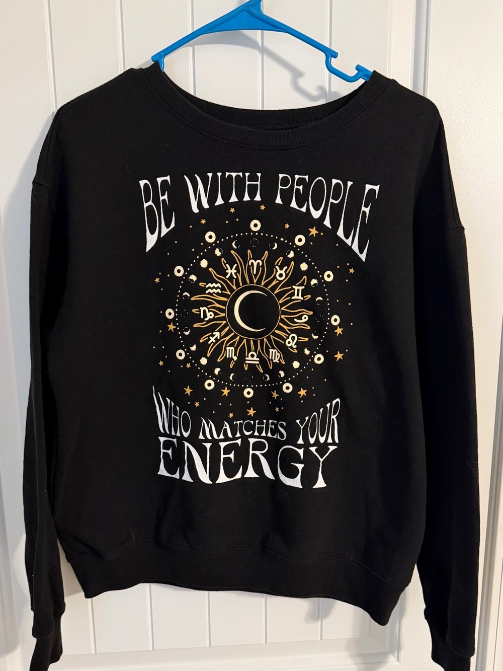 Cold Crush Black Crewneck Sweatshirt with Gold & White Celestial Graphic
